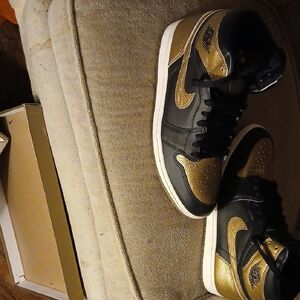 Nike Black and Metallic Gold Sneakers